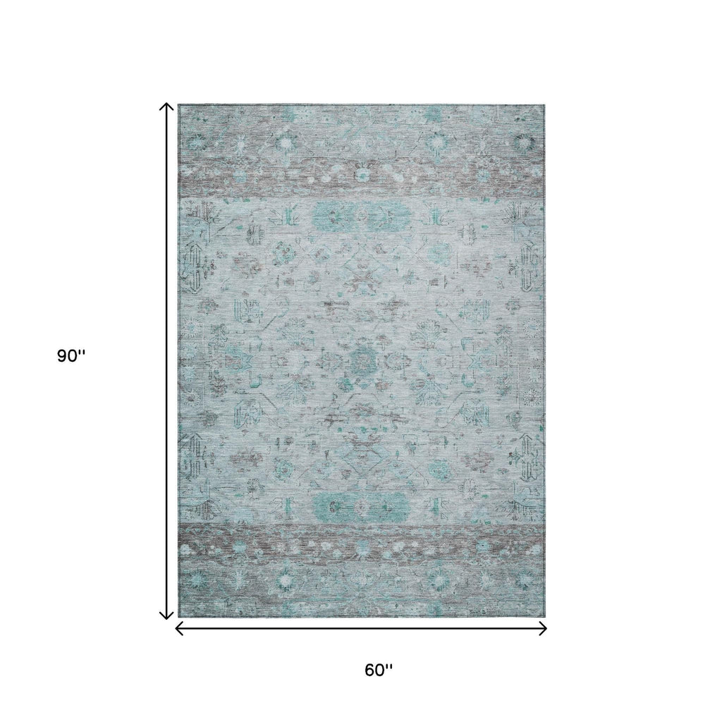 5' X 8' Teal Blue Gray And Silver Tribal Washable Indoor Outdoor Area Rug